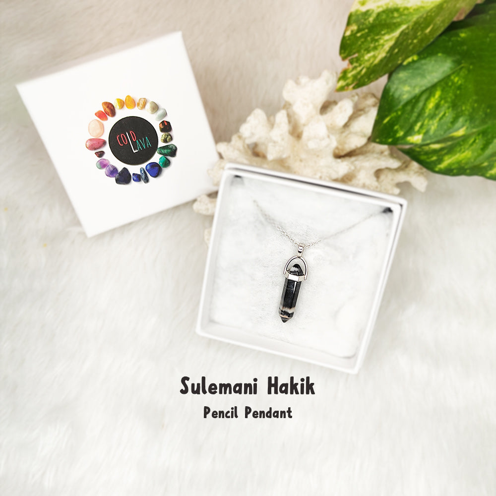 Natural Sulemani Hakik pencil pendant, close-up of crystal point – Cold Lava Studio